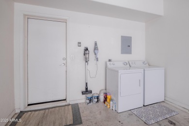 Discover this stunning townhome in the highly sought-after on Palm Valley Golf Club  in Arizona - for sale on GolfHomes.com, golf home, golf lot