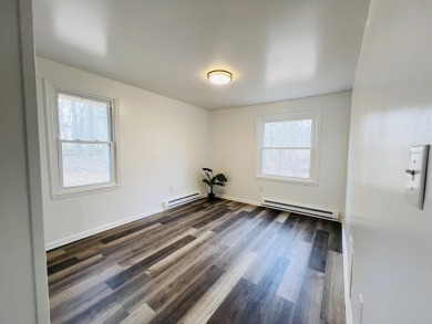 Escape to the Poconos in this beautifully updated 3-bedroom on Pocono Farms Country Club in Pennsylvania - for sale on GolfHomes.com, golf home, golf lot