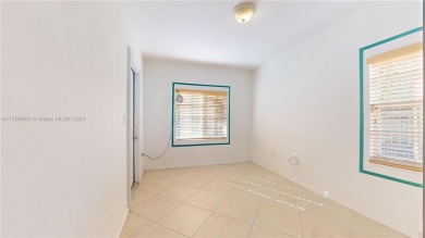 Embrace the quintessential Miami Beach lifestyle in this on Normandy Shores Golf Course in Florida - for sale on GolfHomes.com, golf home, golf lot