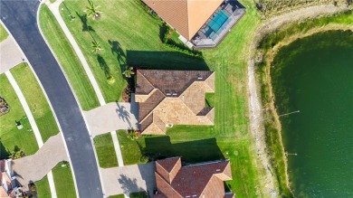 Nestled on a generous oversized lot, this meticulous newer home on Valencia Golf and Country Club in Florida - for sale on GolfHomes.com, golf home, golf lot