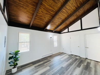 Escape to the Poconos in this beautifully updated 3-bedroom on Pocono Farms Country Club in Pennsylvania - for sale on GolfHomes.com, golf home, golf lot