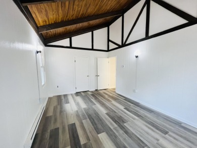 Escape to the Poconos in this beautifully updated 3-bedroom on Pocono Farms Country Club in Pennsylvania - for sale on GolfHomes.com, golf home, golf lot