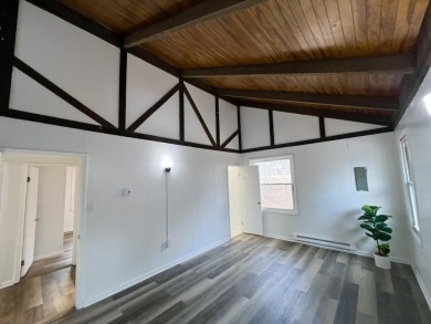 Escape to the Poconos in this beautifully updated 3-bedroom on Pocono Farms Country Club in Pennsylvania - for sale on GolfHomes.com, golf home, golf lot