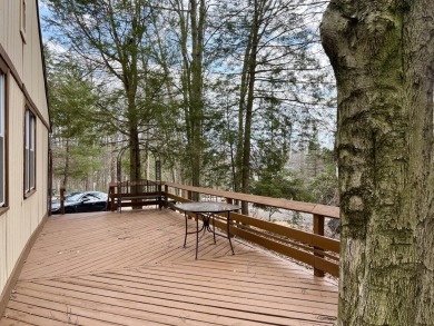 Escape to the Poconos in this beautifully updated 3-bedroom on Pocono Farms Country Club in Pennsylvania - for sale on GolfHomes.com, golf home, golf lot