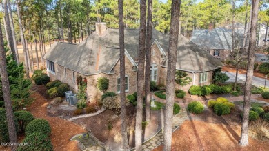 Located just inside Pinewild Country Club, this all brick on Pinewild Country Club of Pinehurst in North Carolina - for sale on GolfHomes.com, golf home, golf lot