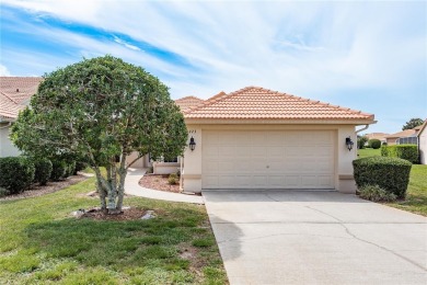 Welcome to this charming two-bedroom, two-bath home with a on Glen Lakes Country Club in Florida - for sale on GolfHomes.com, golf home, golf lot
