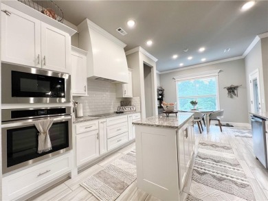 Built in 2022, this beautifully designed 3-bedroom, 2-bath home on Bella Vista Country Club - Highlands in Arkansas - for sale on GolfHomes.com, golf home, golf lot
