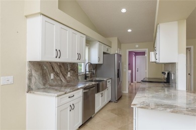 Welcome to this charming two-bedroom, two-bath home with a on Glen Lakes Country Club in Florida - for sale on GolfHomes.com, golf home, golf lot