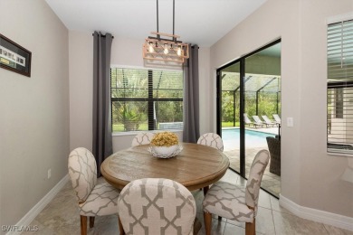 Spacious Oakmont Estate home in Portico overlooks a private on River Hall Country Club in Florida - for sale on GolfHomes.com, golf home, golf lot