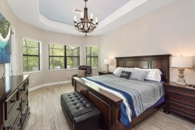Spacious Oakmont Estate home in Portico overlooks a private on River Hall Country Club in Florida - for sale on GolfHomes.com, golf home, golf lot