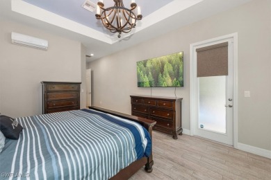 Spacious Oakmont Estate home in Portico overlooks a private on River Hall Country Club in Florida - for sale on GolfHomes.com, golf home, golf lot