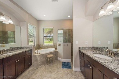 Spacious Oakmont Estate home in Portico overlooks a private on River Hall Country Club in Florida - for sale on GolfHomes.com, golf home, golf lot