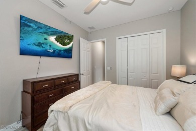 Spacious Oakmont Estate home in Portico overlooks a private on River Hall Country Club in Florida - for sale on GolfHomes.com, golf home, golf lot