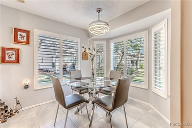 The POND Views are amazing at this beautifully updated, end unit on Timber Pines Golf Course in Florida - for sale on GolfHomes.com, golf home, golf lot