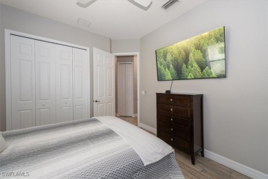 Spacious Oakmont Estate home in Portico overlooks a private on River Hall Country Club in Florida - for sale on GolfHomes.com, golf home, golf lot