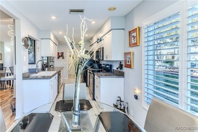 The POND Views are amazing at this beautifully updated, end unit on Timber Pines Golf Course in Florida - for sale on GolfHomes.com, golf home, golf lot