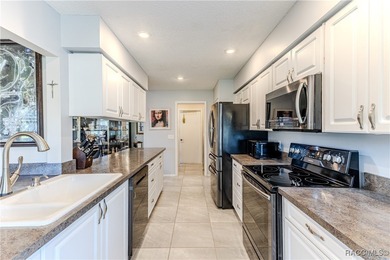 The POND Views are amazing at this beautifully updated, end unit on Timber Pines Golf Course in Florida - for sale on GolfHomes.com, golf home, golf lot