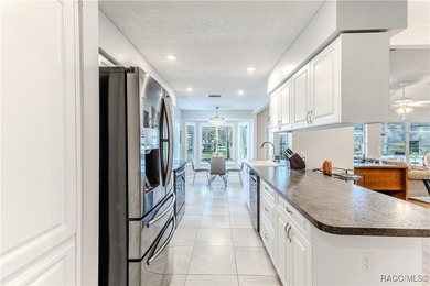 The POND Views are amazing at this beautifully updated, end unit on Timber Pines Golf Course in Florida - for sale on GolfHomes.com, golf home, golf lot