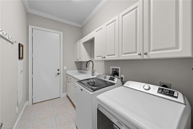 Welcome to this exceptional Porta Rosa villa, nestled within on Shadow Wood Preserve in Florida - for sale on GolfHomes.com, golf home, golf lot