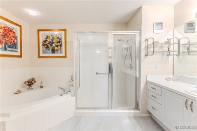 The POND Views are amazing at this beautifully updated, end unit on Timber Pines Golf Course in Florida - for sale on GolfHomes.com, golf home, golf lot