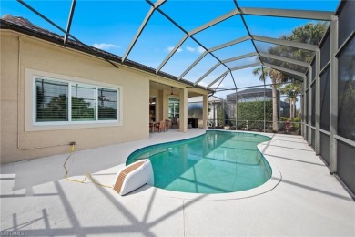 Welcome to this exceptional Porta Rosa villa, nestled within on Shadow Wood Preserve in Florida - for sale on GolfHomes.com, golf home, golf lot