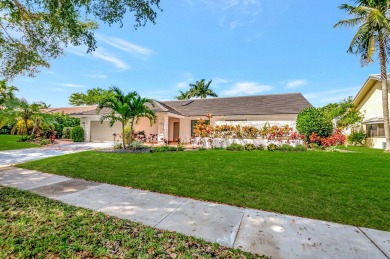 Welcome to a truly unique property nestled in the Woodlake on Deer Creek Golf Club in Florida - for sale on GolfHomes.com, golf home, golf lot