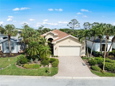Welcome to this exceptional Porta Rosa villa, nestled within on Shadow Wood Preserve in Florida - for sale on GolfHomes.com, golf home, golf lot