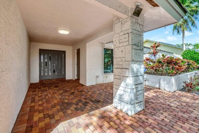 Welcome to a truly unique property nestled in the Woodlake on Deer Creek Golf Club in Florida - for sale on GolfHomes.com, golf home, golf lot