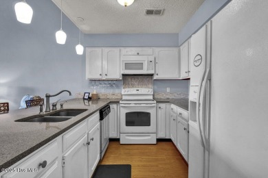 Experience coastal living at its finest in this beautifully on Brick Landing Plantation Yacht and Golf Club in North Carolina - for sale on GolfHomes.com, golf home, golf lot