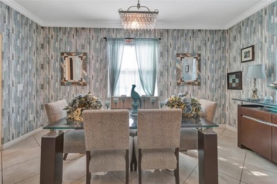 One or more photo(s) has been virtually staged. This home can be on The Oasis Club at Champions Gate in Florida - for sale on GolfHomes.com, golf home, golf lot