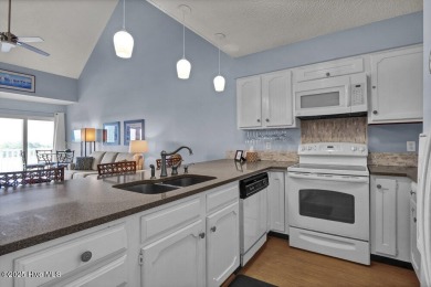 Experience coastal living at its finest in this beautifully on Brick Landing Plantation Yacht and Golf Club in North Carolina - for sale on GolfHomes.com, golf home, golf lot