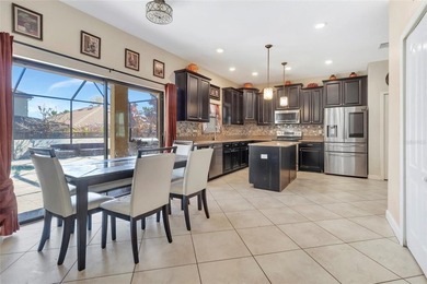 One or more photo(s) has been virtually staged. This home can be on The Oasis Club at Champions Gate in Florida - for sale on GolfHomes.com, golf home, golf lot