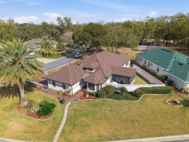This concrete block/stucco home boasts a new roof and gutters in on Monarch At Royal Highlands in Florida - for sale on GolfHomes.com, golf home, golf lot