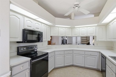 This concrete block/stucco home boasts a new roof and gutters in on Monarch At Royal Highlands in Florida - for sale on GolfHomes.com, golf home, golf lot