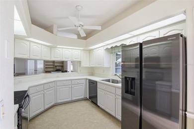 This concrete block/stucco home boasts a new roof and gutters in on Monarch At Royal Highlands in Florida - for sale on GolfHomes.com, golf home, golf lot