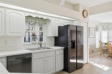 This concrete block/stucco home boasts a new roof and gutters in on Monarch At Royal Highlands in Florida - for sale on GolfHomes.com, golf home, golf lot