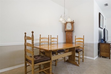 This concrete block/stucco home boasts a new roof and gutters in on Monarch At Royal Highlands in Florida - for sale on GolfHomes.com, golf home, golf lot