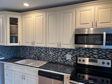 Turnkey, Fully Furnished Renovated End Unit in a Premier 55+ on On Top Of The World Golf Course in Florida - for sale on GolfHomes.com, golf home, golf lot
