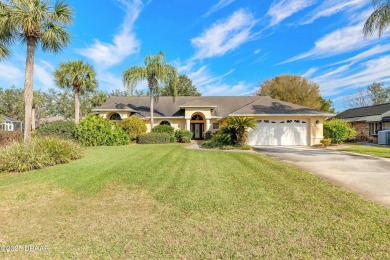 Welcome to this exceptional 3-bedroom, 2-bathroom home located on Spruce Creek Golf Club in Florida - for sale on GolfHomes.com, golf home, golf lot