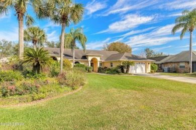 Welcome to this exceptional 3-bedroom, 2-bathroom home located on Spruce Creek Golf Club in Florida - for sale on GolfHomes.com, golf home, golf lot