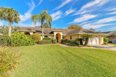 Welcome to this exceptional 3-bedroom, 2-bathroom home located on Spruce Creek Golf Club in Florida - for sale on GolfHomes.com, golf home, golf lot