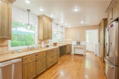 Spacious 4 bedroom, 4.5 bath side-to-side split located in a on Leawood South Country Club in Kansas - for sale on GolfHomes.com, golf home, golf lot