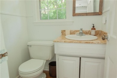 Spacious 4 bedroom, 4.5 bath side-to-side split located in a on Leawood South Country Club in Kansas - for sale on GolfHomes.com, golf home, golf lot