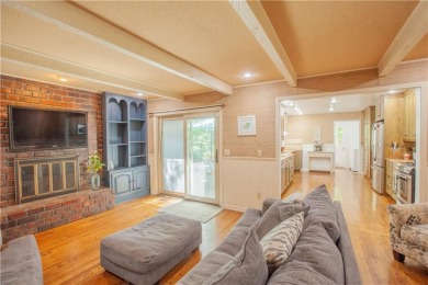 Spacious 4 bedroom, 4.5 bath side-to-side split located in a on Leawood South Country Club in Kansas - for sale on GolfHomes.com, golf home, golf lot