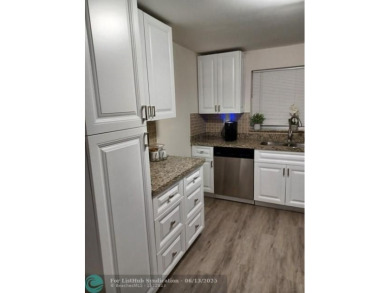 Breathtaking view of Serene Lake, charming 2/2. Modern kitchen on Sunrise Lakes Phase III in Florida - for sale on GolfHomes.com, golf home, golf lot