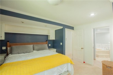 Spacious 4 bedroom, 4.5 bath side-to-side split located in a on Leawood South Country Club in Kansas - for sale on GolfHomes.com, golf home, golf lot