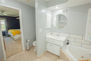 Spacious 4 bedroom, 4.5 bath side-to-side split located in a on Leawood South Country Club in Kansas - for sale on GolfHomes.com, golf home, golf lot