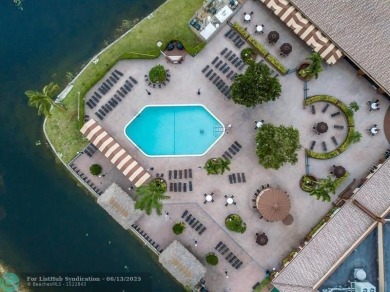 Breathtaking view of Serene Lake, charming 2/2. Modern kitchen on Sunrise Lakes Phase III in Florida - for sale on GolfHomes.com, golf home, golf lot