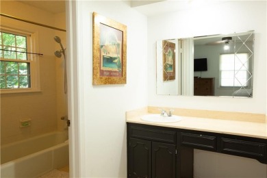 Spacious 4 bedroom, 4.5 bath side-to-side split located in a on Leawood South Country Club in Kansas - for sale on GolfHomes.com, golf home, golf lot
