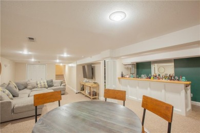 Spacious 4 bedroom, 4.5 bath side-to-side split located in a on Leawood South Country Club in Kansas - for sale on GolfHomes.com, golf home, golf lot